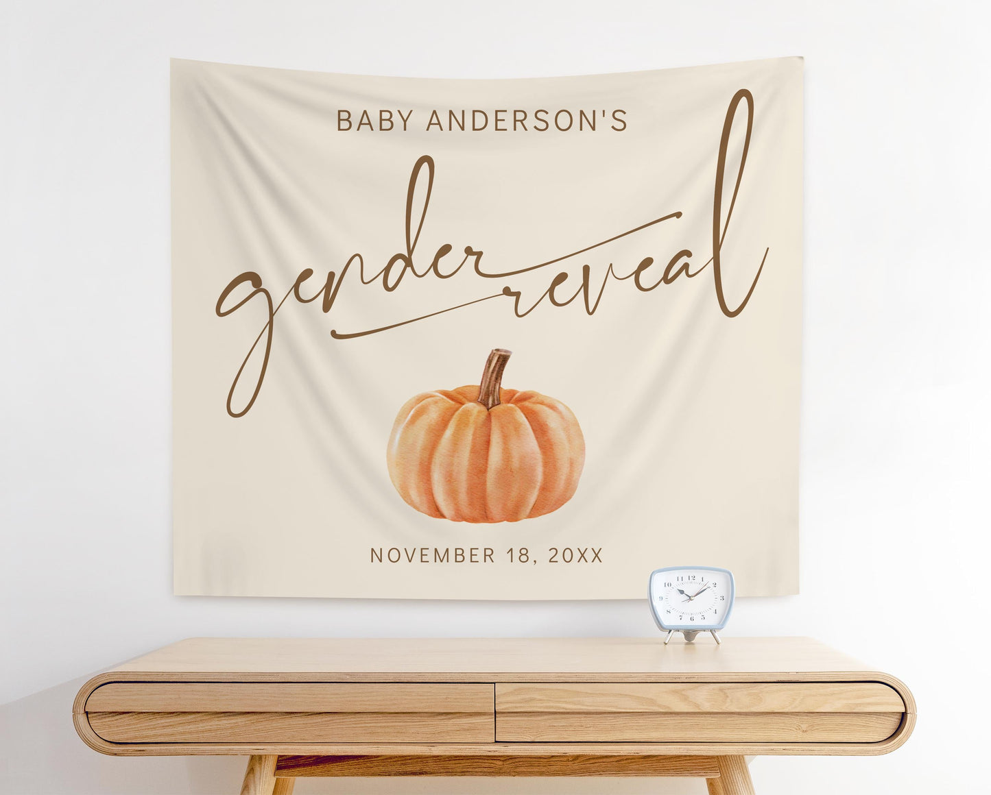 baby gender reveal photo backdrop for fall pumpkin baby shower.  neutral beige background with modern minimal design of watercolor pumpkin.  Reads "Baby Anderson's Gender Reveal November 18, 20XX"
