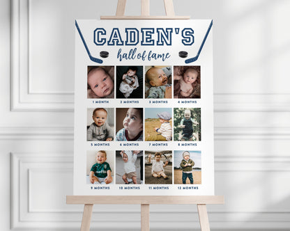 Hockey Hall of Fame Editable Photo Board for 1st birthday party featuring baby's 12 months photos. Hockey sticks and pucks surround child's name and "hall of fame".  Colors and fonts can be changed.