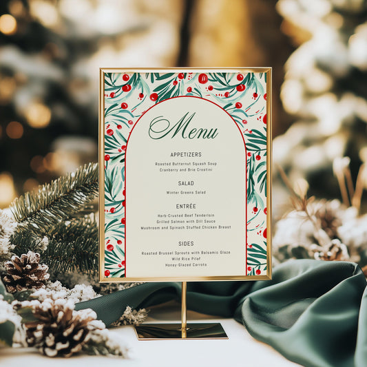christmas party dinner menu in gold frame.  vintage modern design of holly and berries with menu text in arch design.