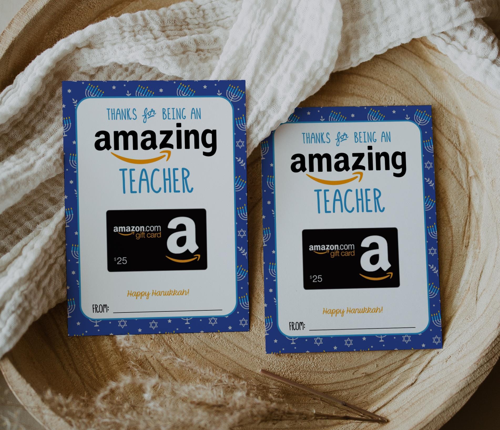 Hanukkah gift card holder for Amazing teacher holding amazon gift card. blue background with jewish star of david and menorahs in white and silver accents of yellowish gold.  Reads &quot;thanks for being an amazing teacher, happy hanukkah!&quot;  Spot at bottom to write who it&#39;s from.