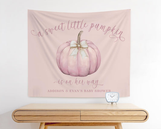 dusty rose blush pink pumpkin baby shower backdrop, featuring a beige bow on pumpkin graphic.  reads &quot;a sweet little pumpkin is on her way&quot;